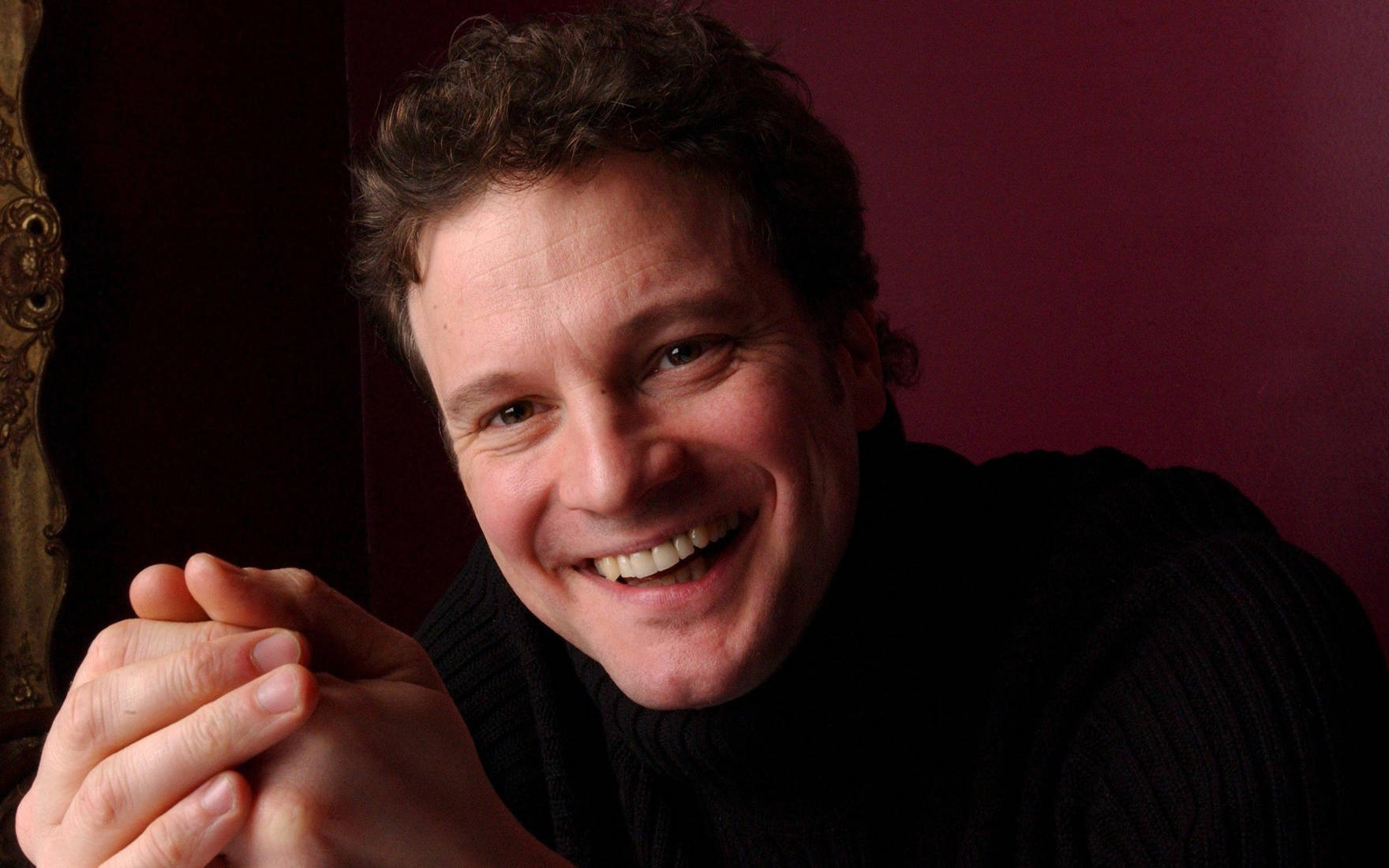 Smiling English Actor Colin Firth Background