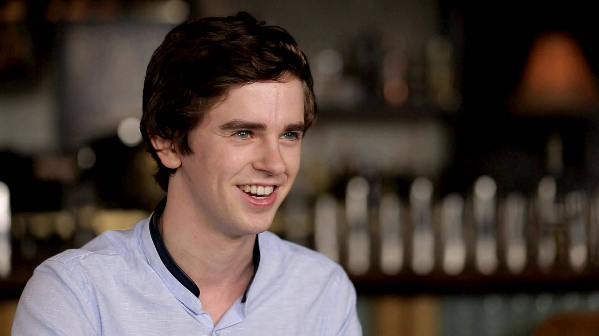 Smiling Freddie Highmore Focus Shot