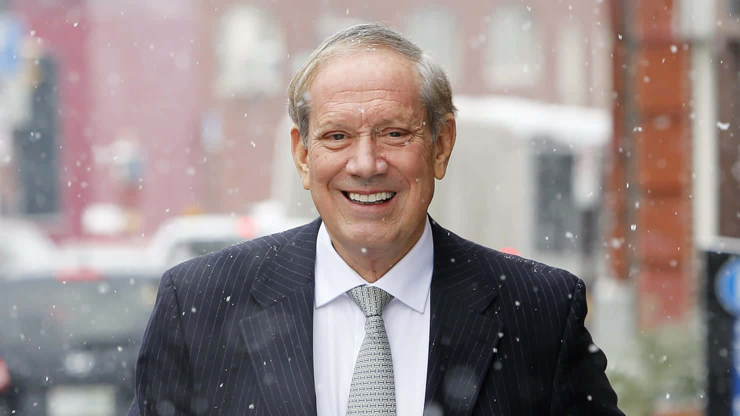 Smiling Georfge Pataki In Snow Background