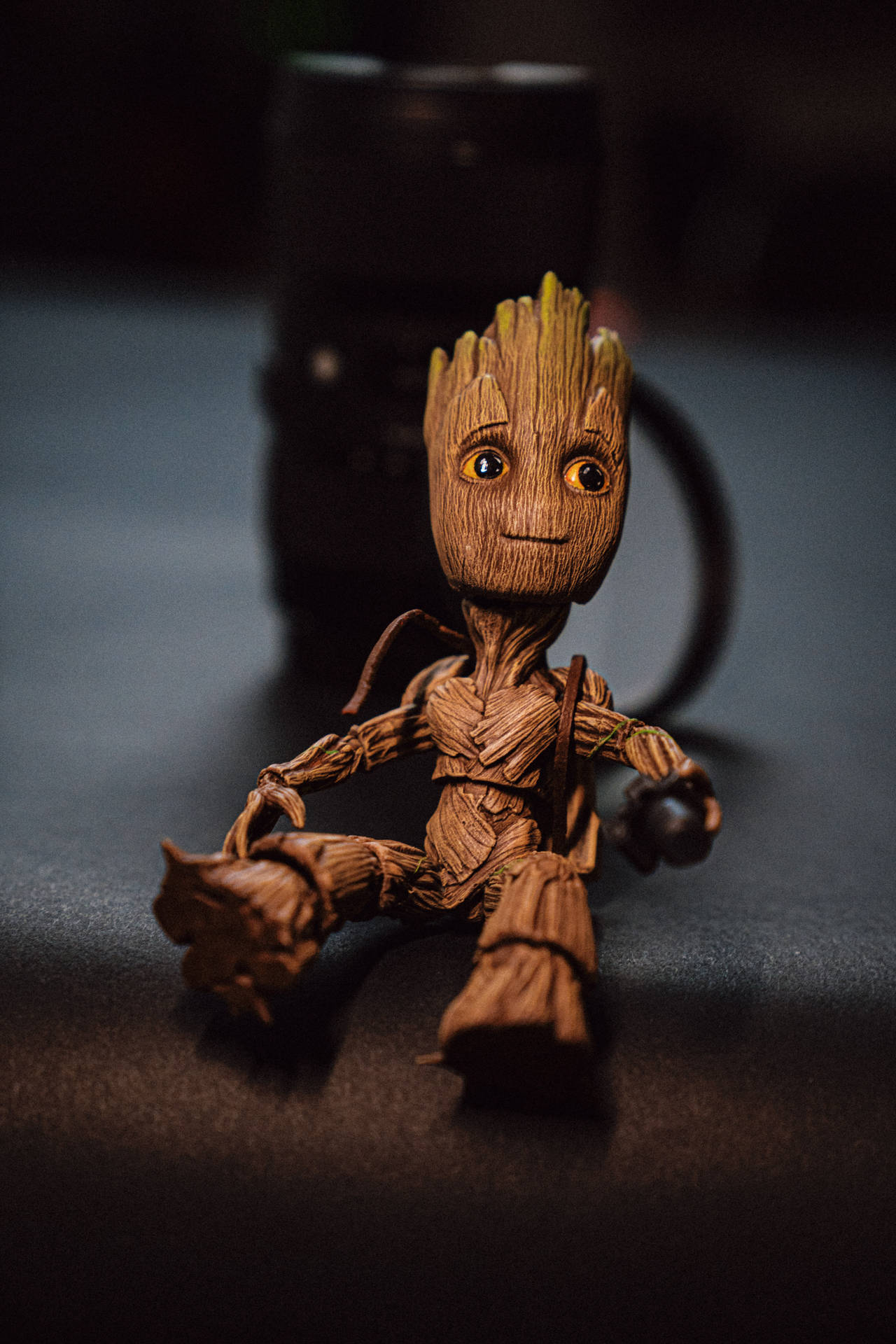 Smiling Groot Figurine Background