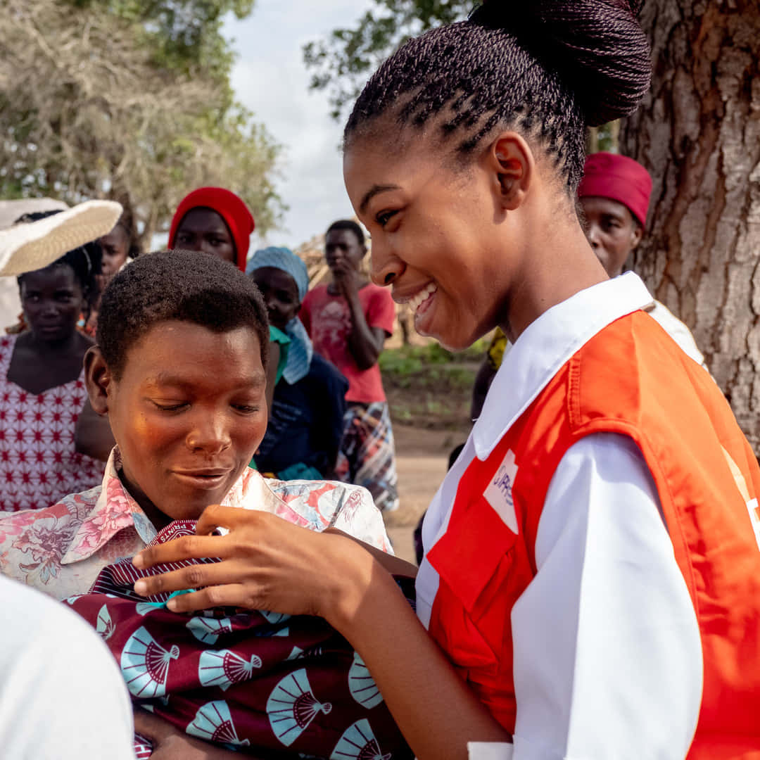 Smiling Humanitarian Worker Background