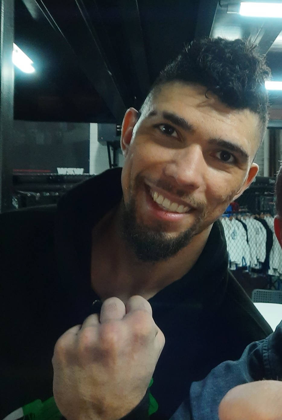 Smiling Johnny Walker Showing Clenched Fist Background