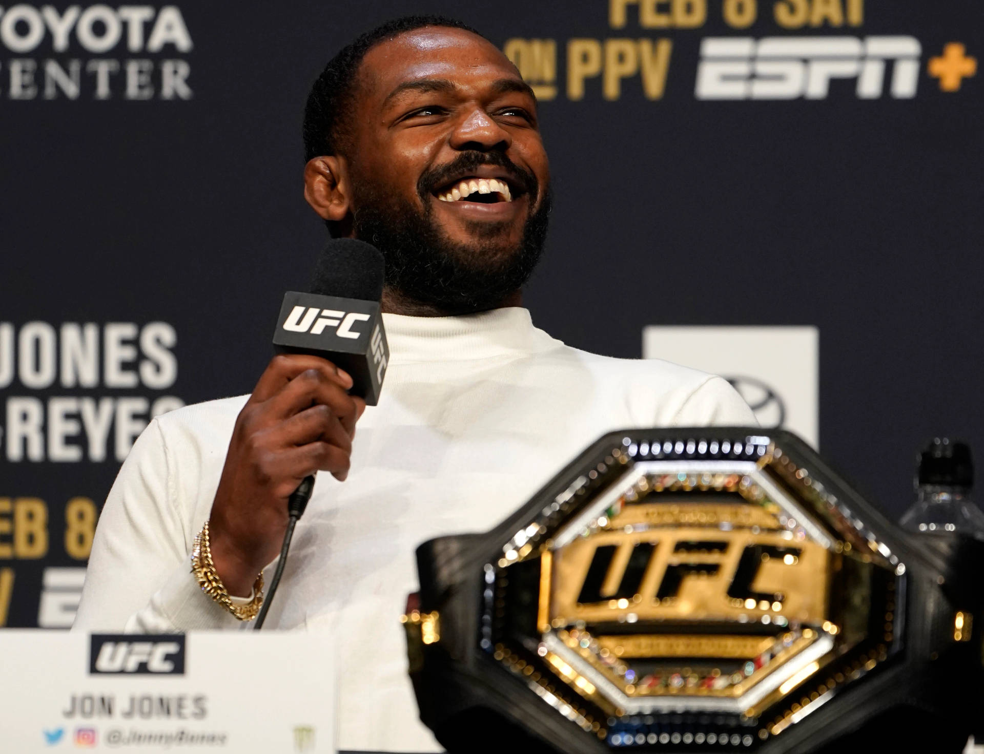 Smiling Jon Jones At Press Con Background