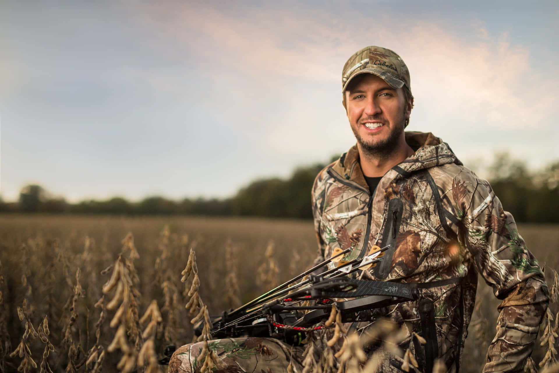 Smiling Man In Hunting Camo Background
