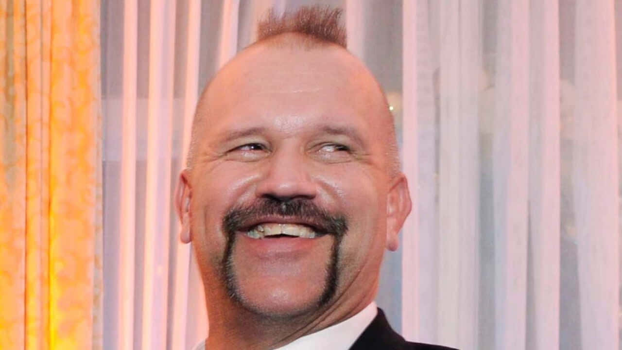Smiling_ Man_ In_ Tuxedo.jpg Background