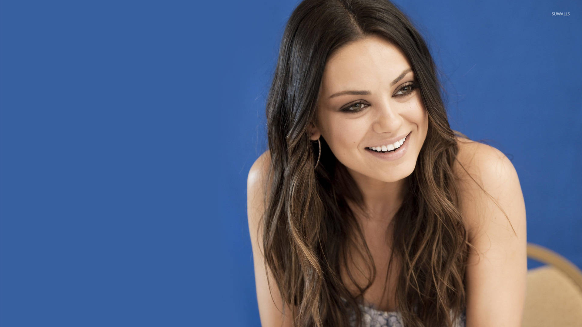 Smiling Mila Kunis Background