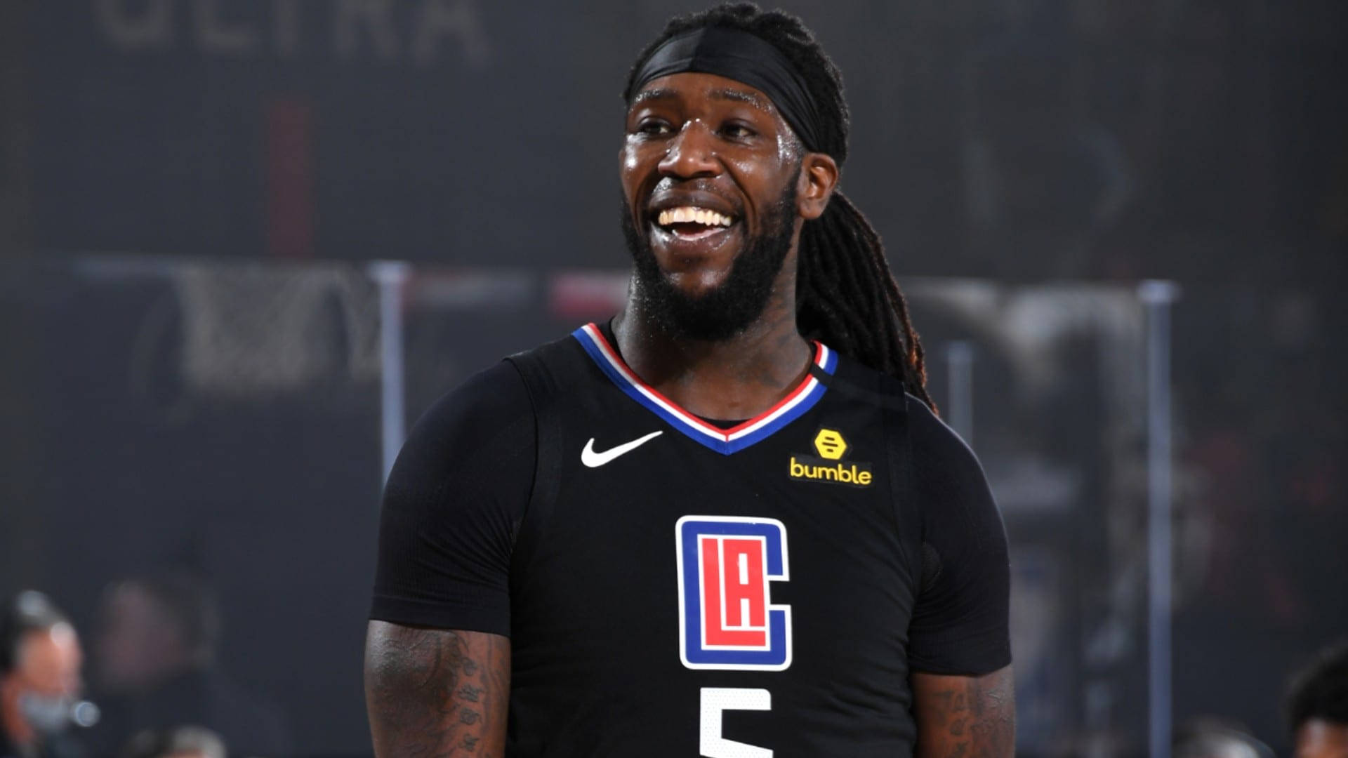 Smiling Montrezl Harrell, Player Of The Clippers, During A Game Background