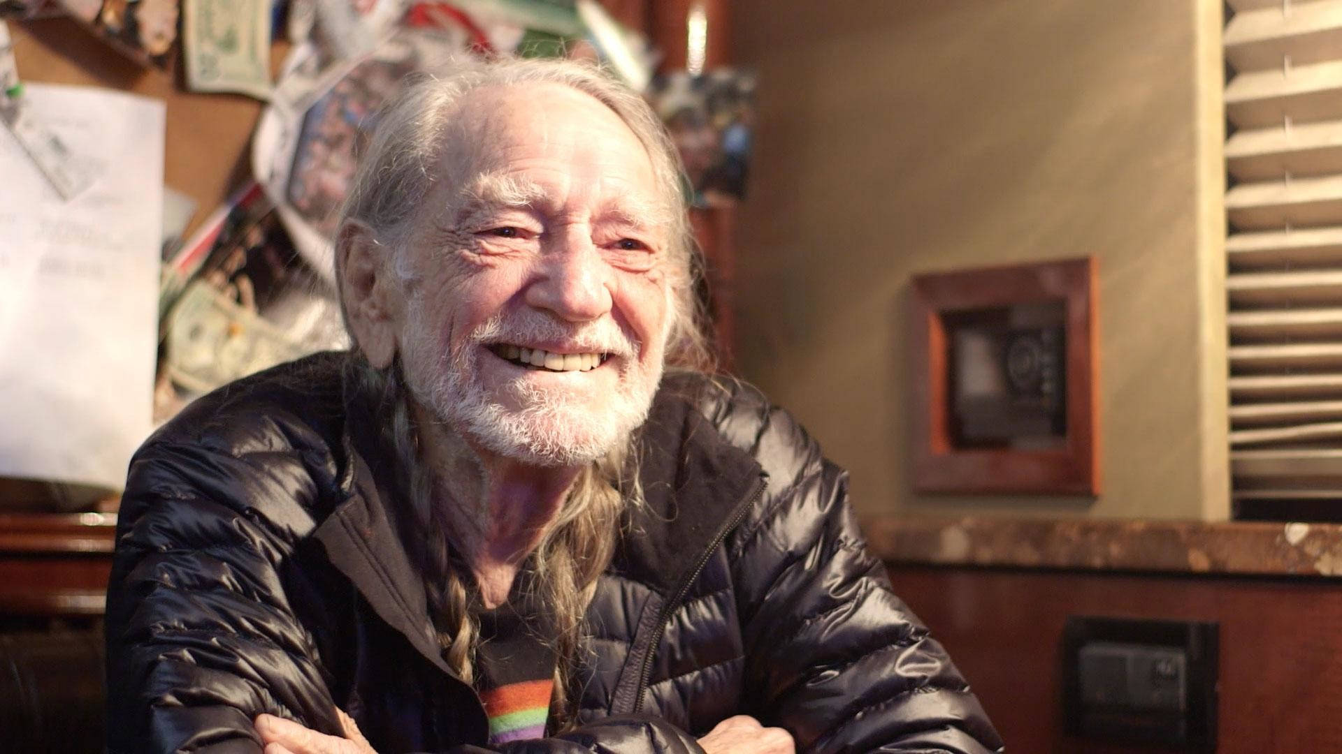 Smiling Musician Willie Nelson Background