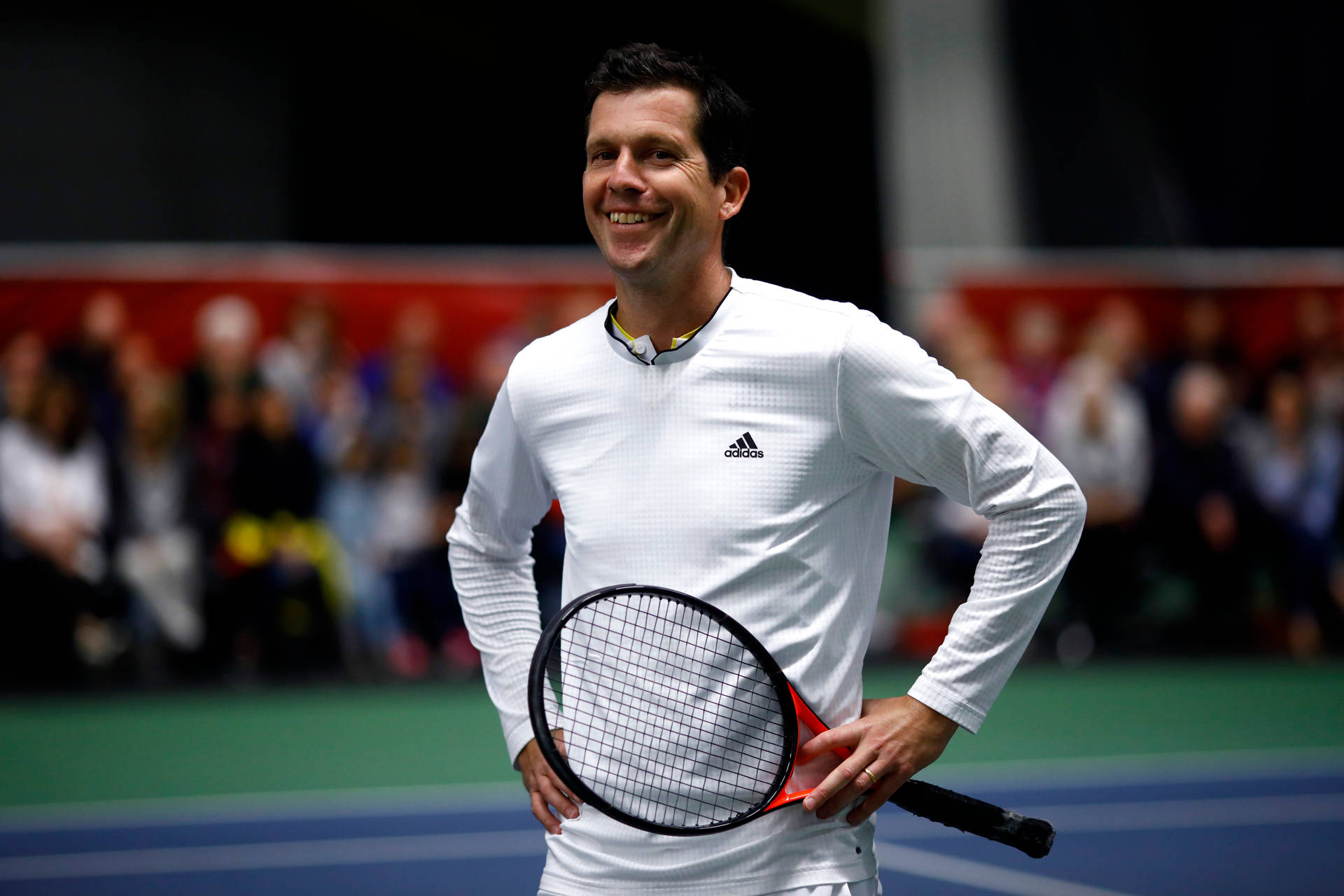 Smiling Portrait Of Tennis Legend Tim Henman Background