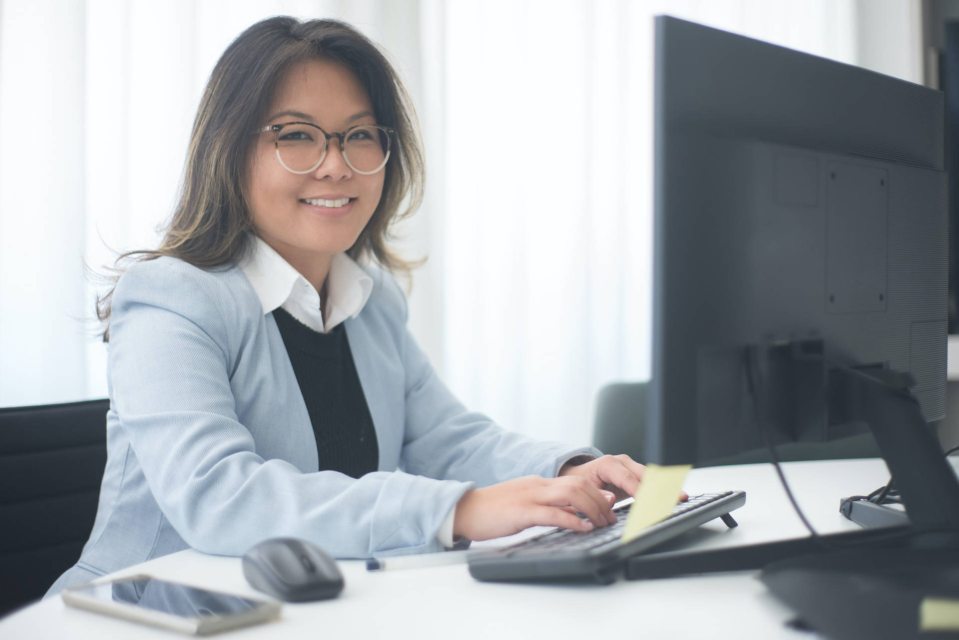 Smiling Professional Secretary At Work Background