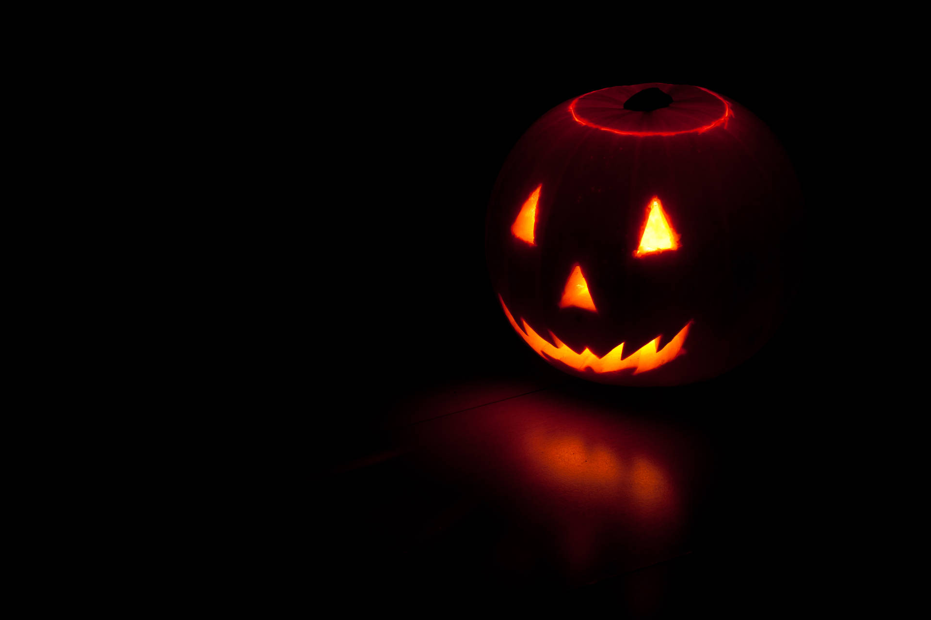 Smiling Pumpkin On Halloween Background