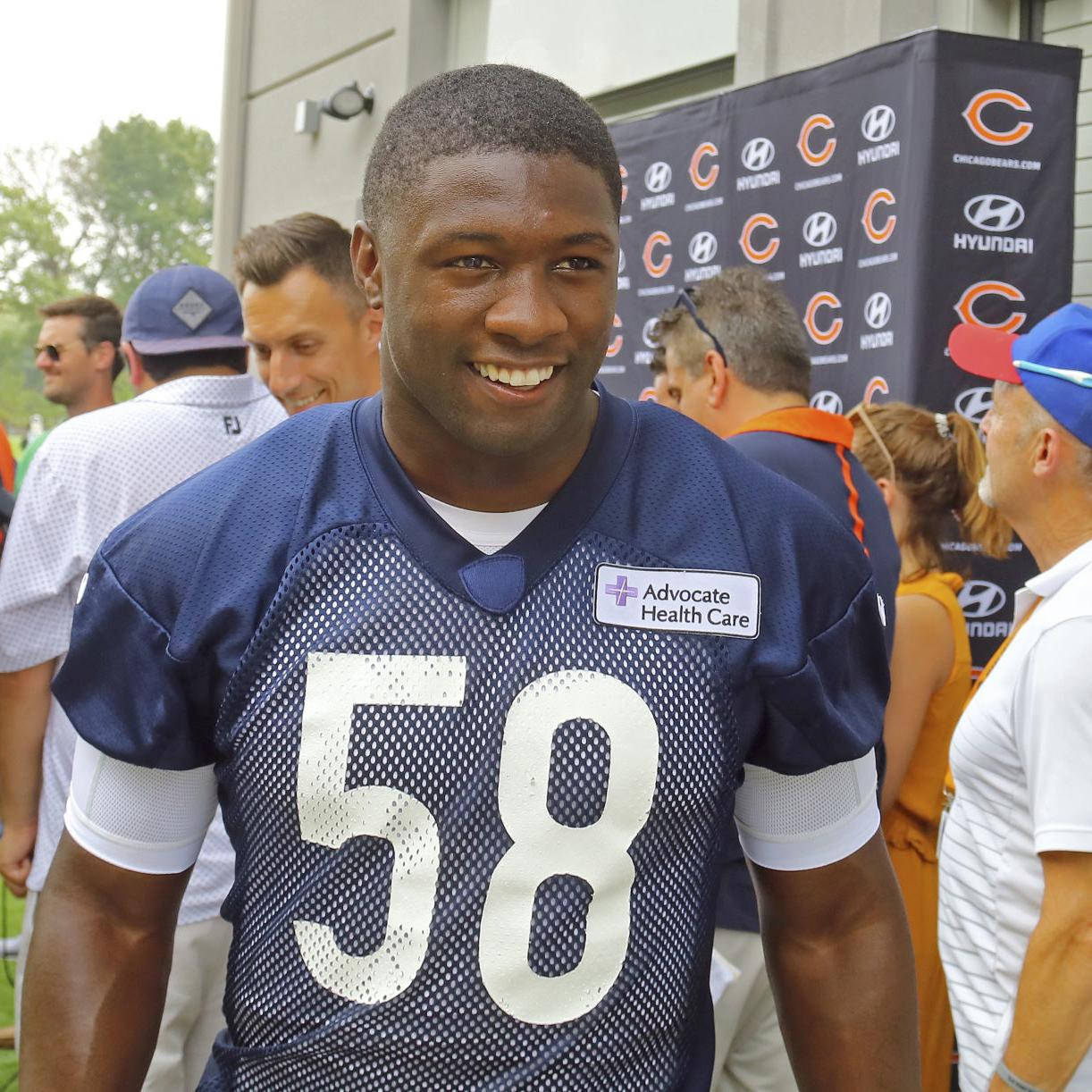 Smiling Roquan Smith In Mesh Jersey Background