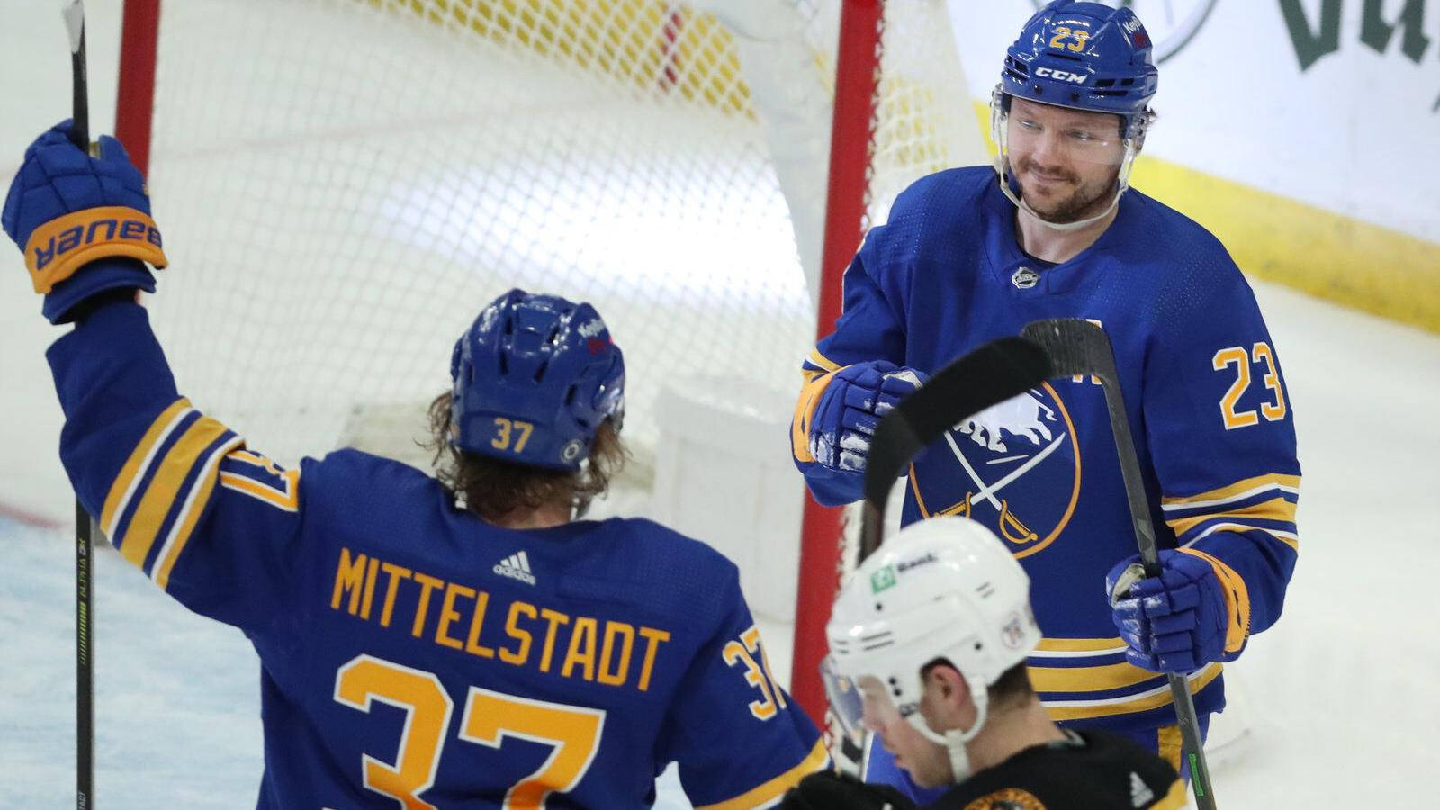 Smiling Sam Reinhart In Buffalo Sabres Background