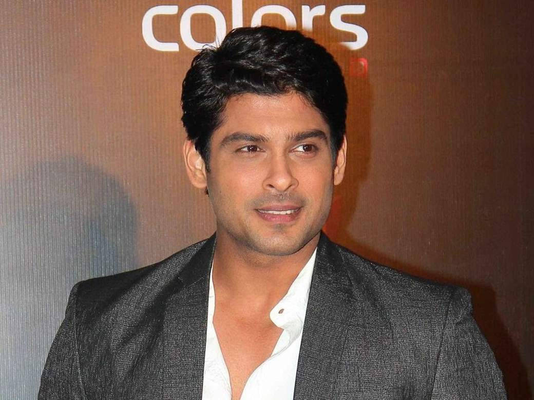 Smiling Sidharth Shukla In Black Suit Close-up