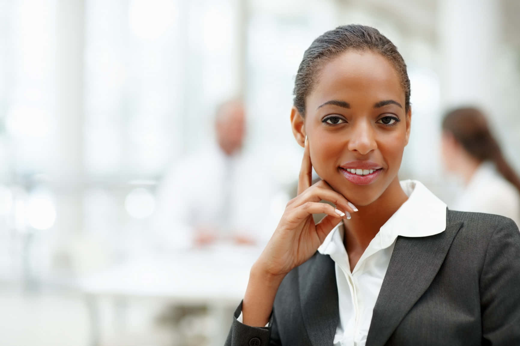 Smiling South African Woman In Formal Attire Background