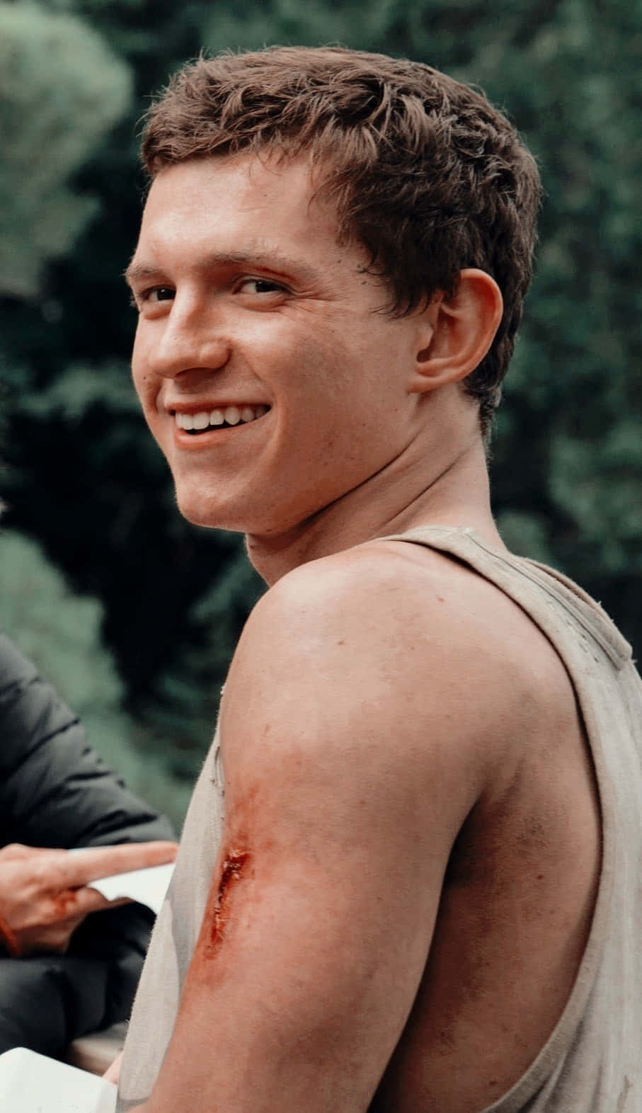 Smiling Tom Holland Aesthetic Background