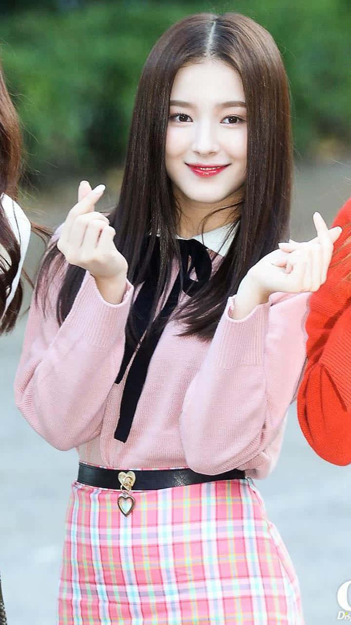 Smiling Woman Finger Heart Gesture Background