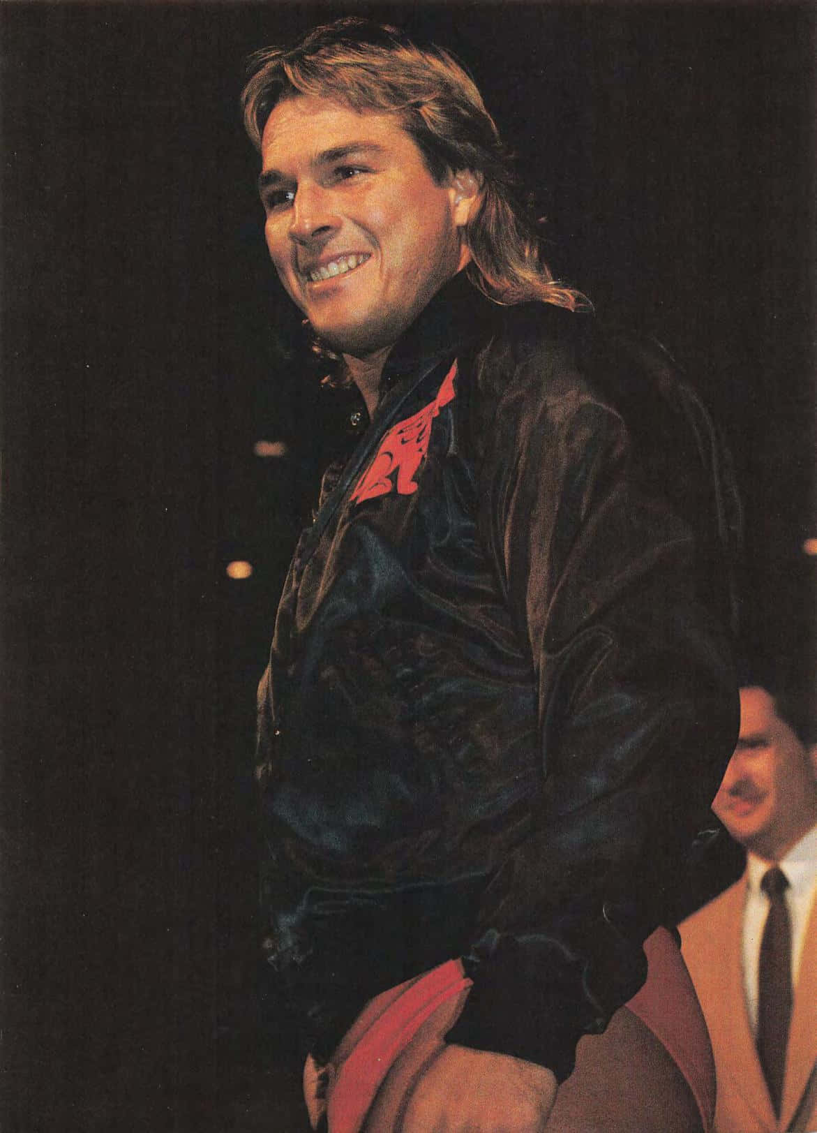 Smiling Wrestlerin Black Jacket Background