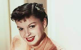 Smiling Young American Actress Judy Garland Background