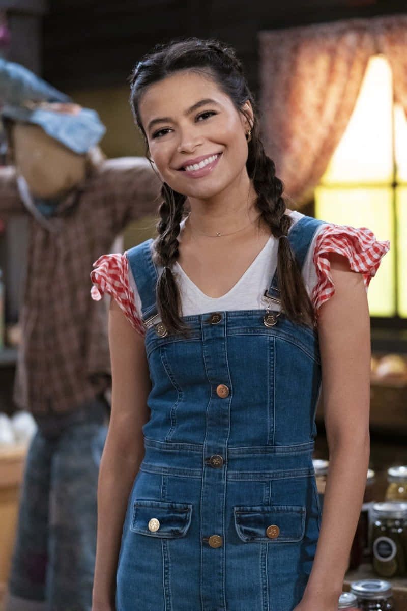 Smiling Young Womanin Denim Overalls Background