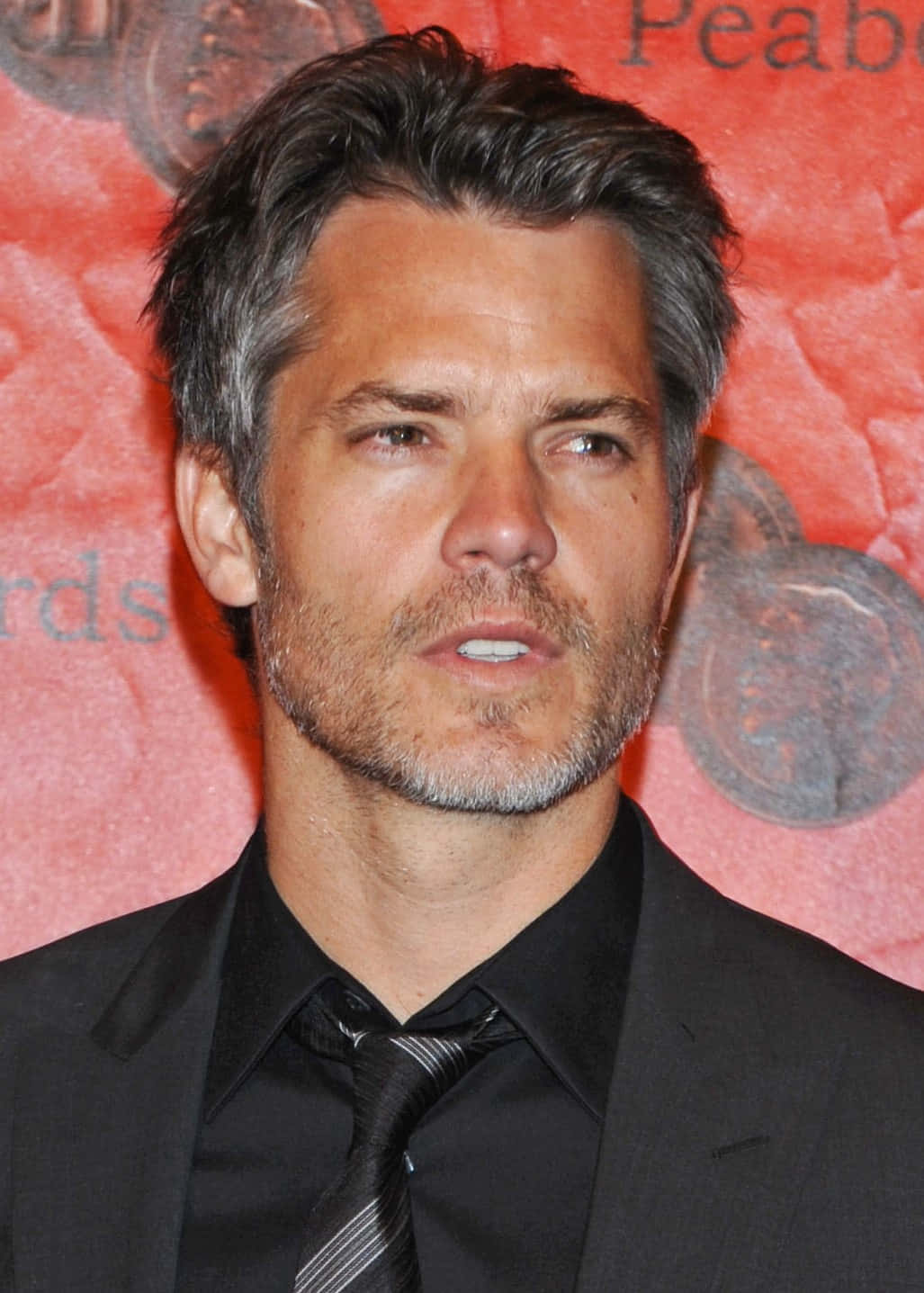 Smirking Timothy Olyphant Background