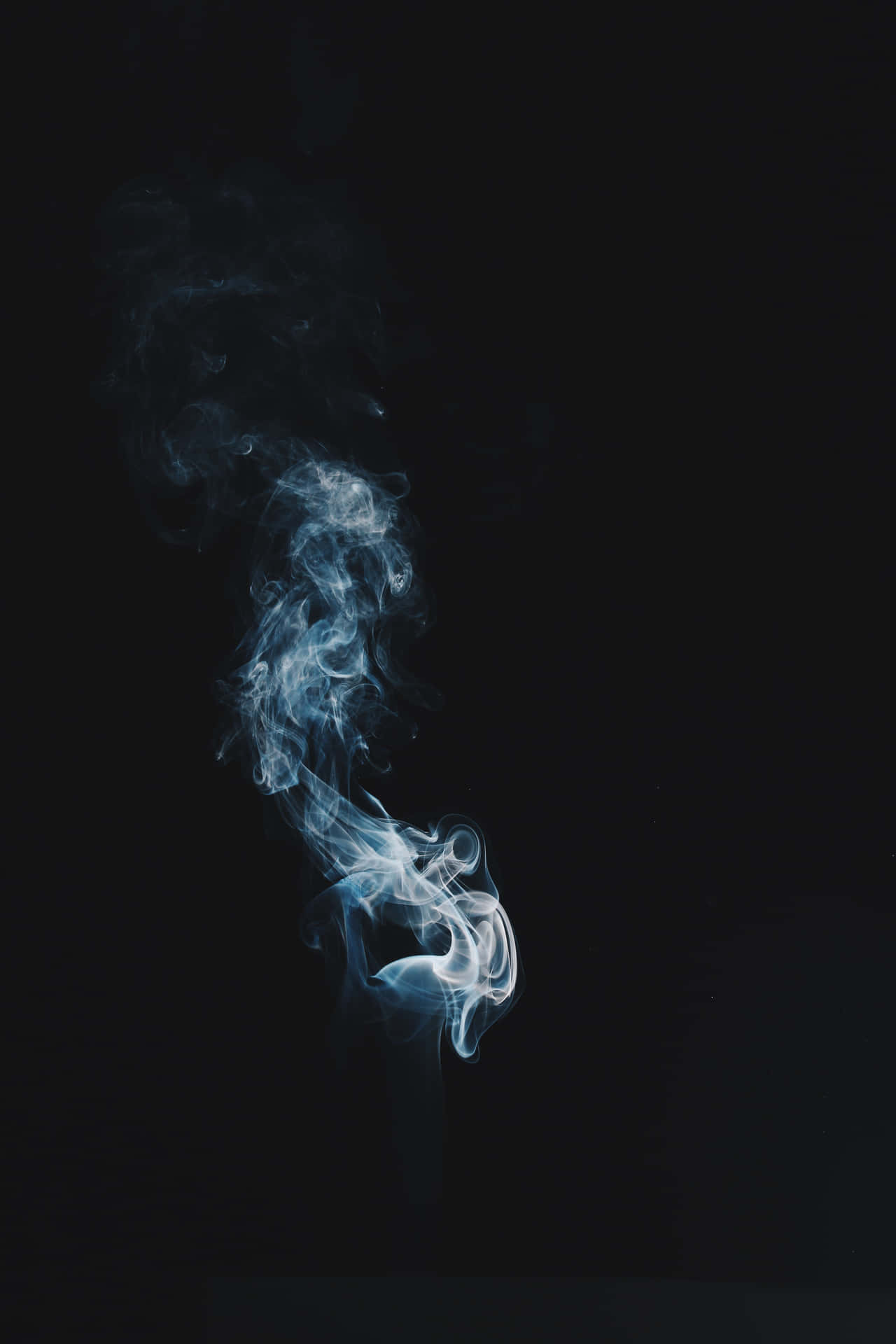 Smoke On A Black Background Background