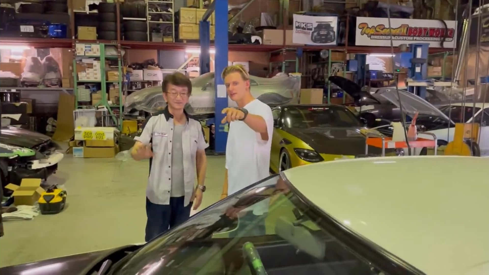 Smokey Nagata Garage Visit Background