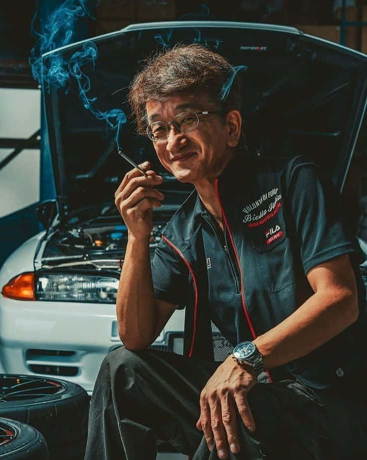 Smokey Nagata Photo After Car Repair Background