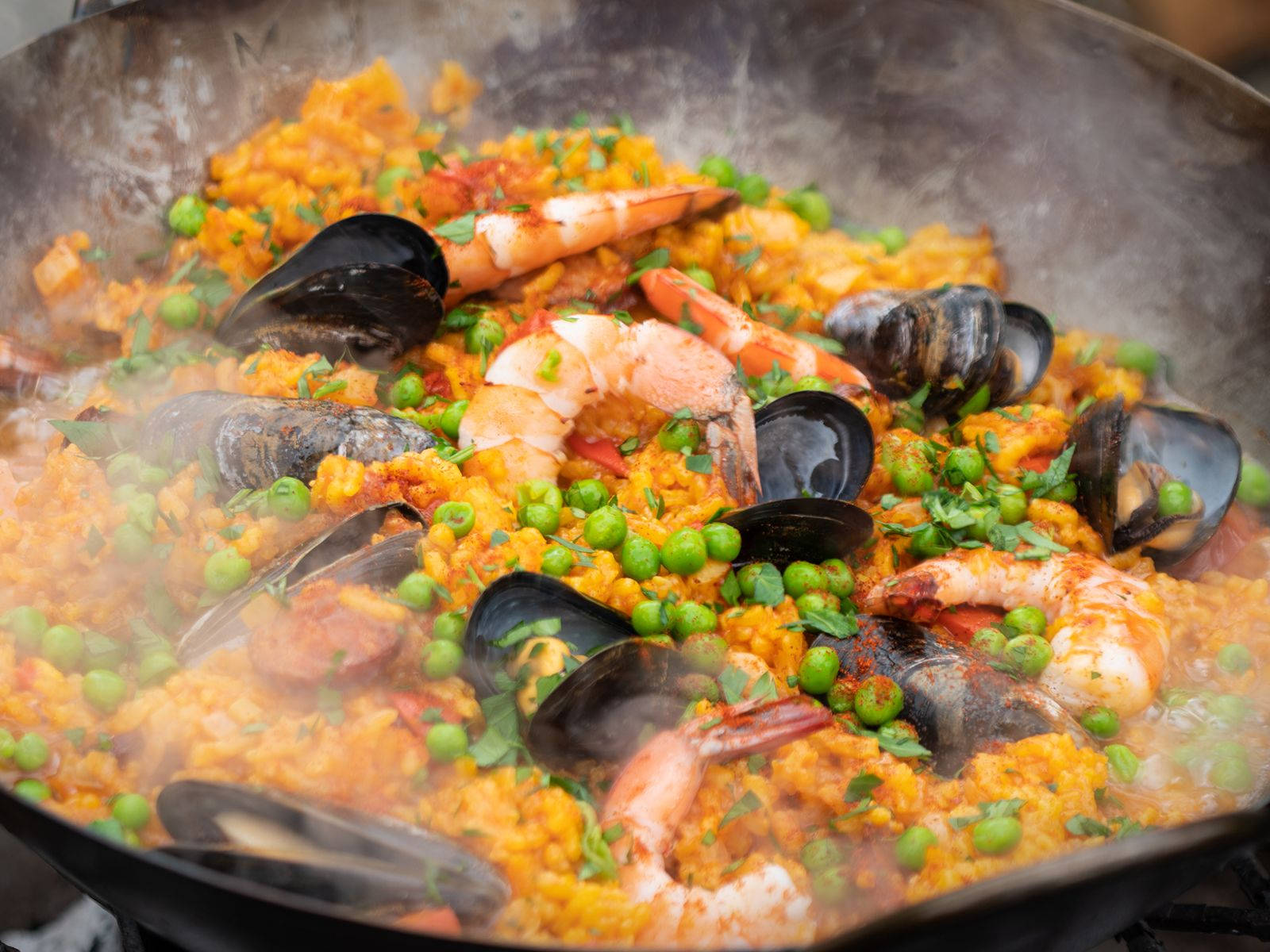 Smoking Hot Paella With Green Peas