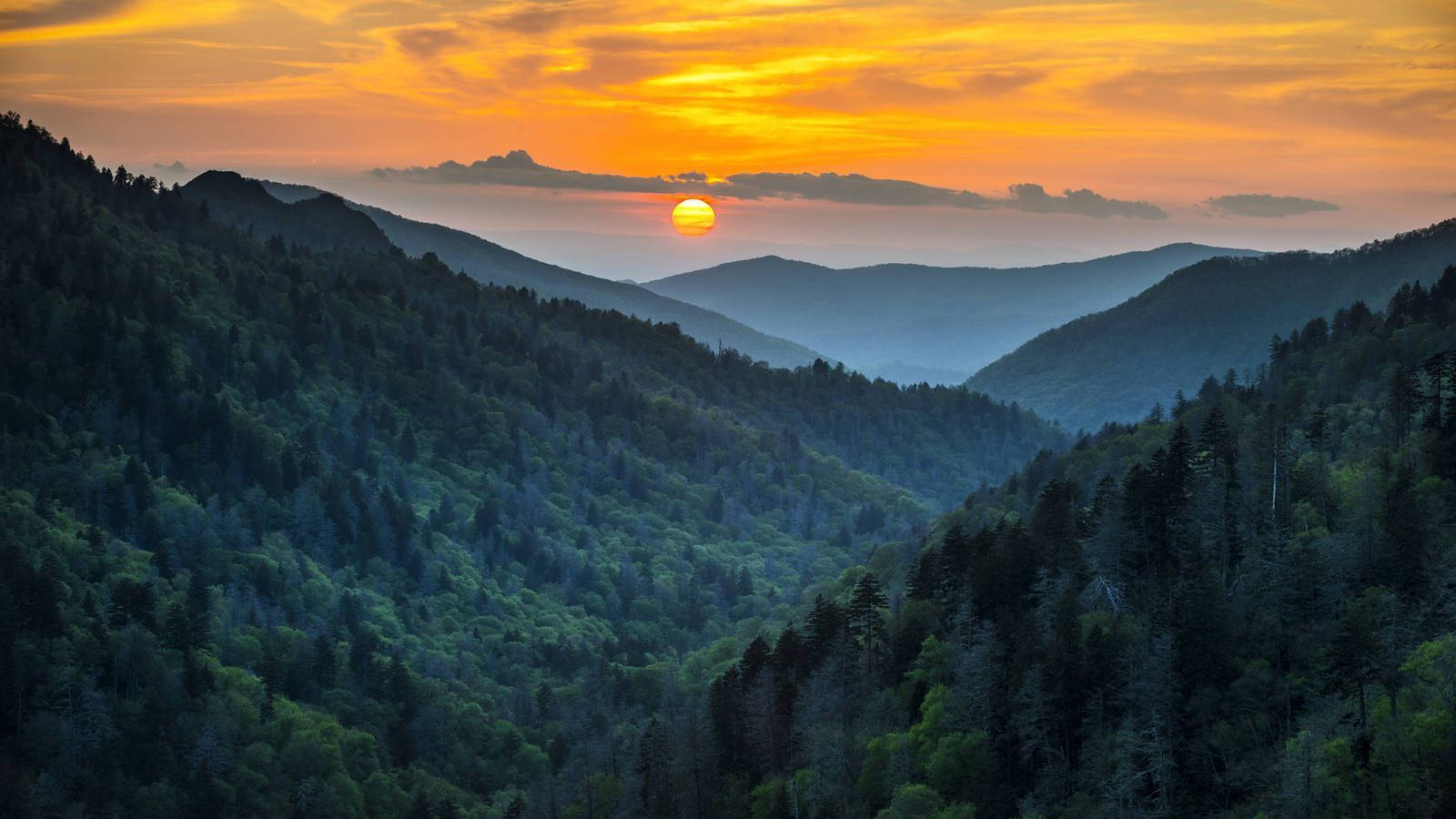 Smoky Mountains With Yellow Sunset Background