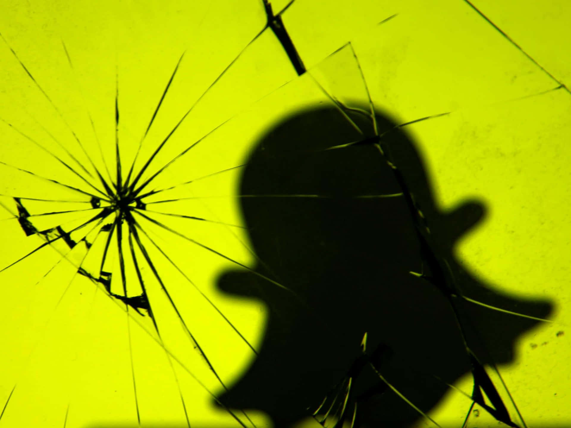 Snapchat Logo Shadowon Broken Glass Background