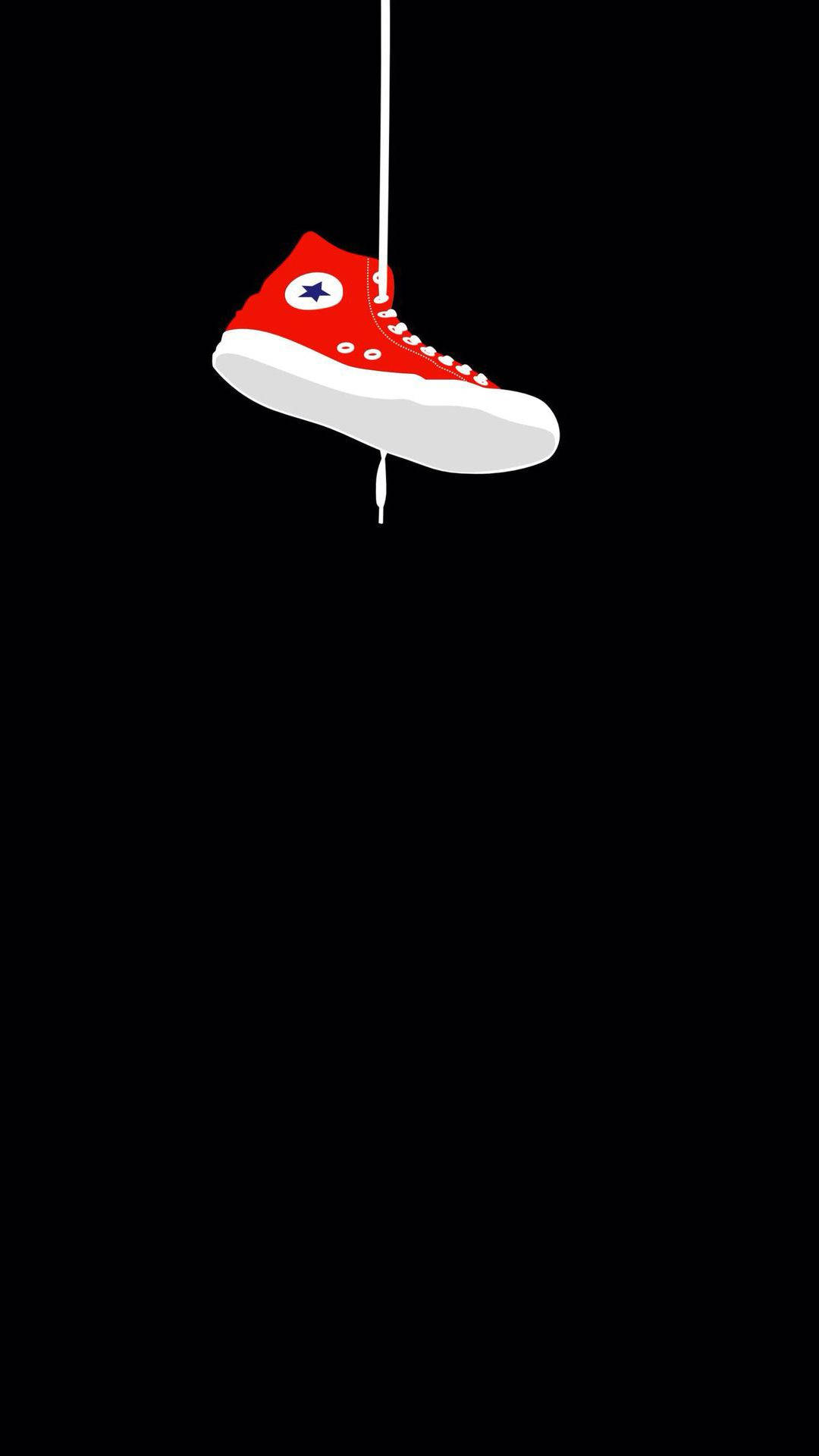 Sneaker Converse Hangs By Shoelace