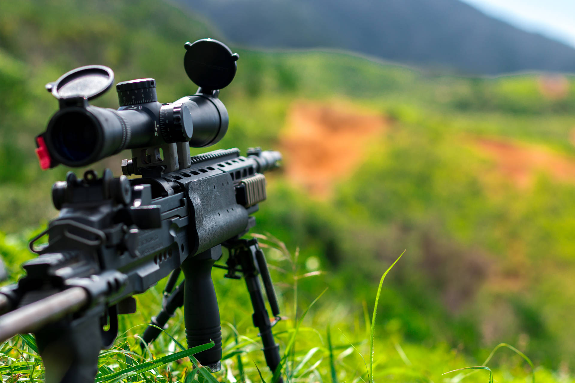 Sniper Gun On A Hill Background