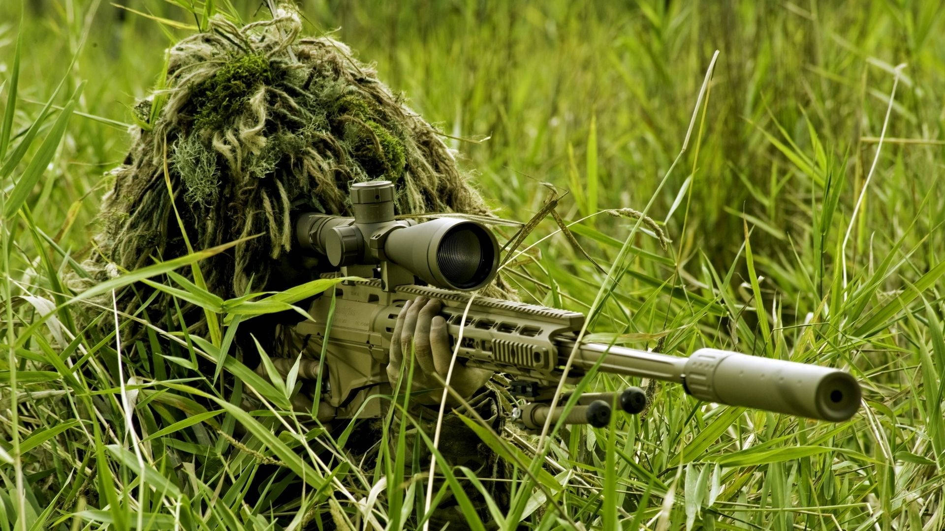 Sniper In Grass Camouflage Background