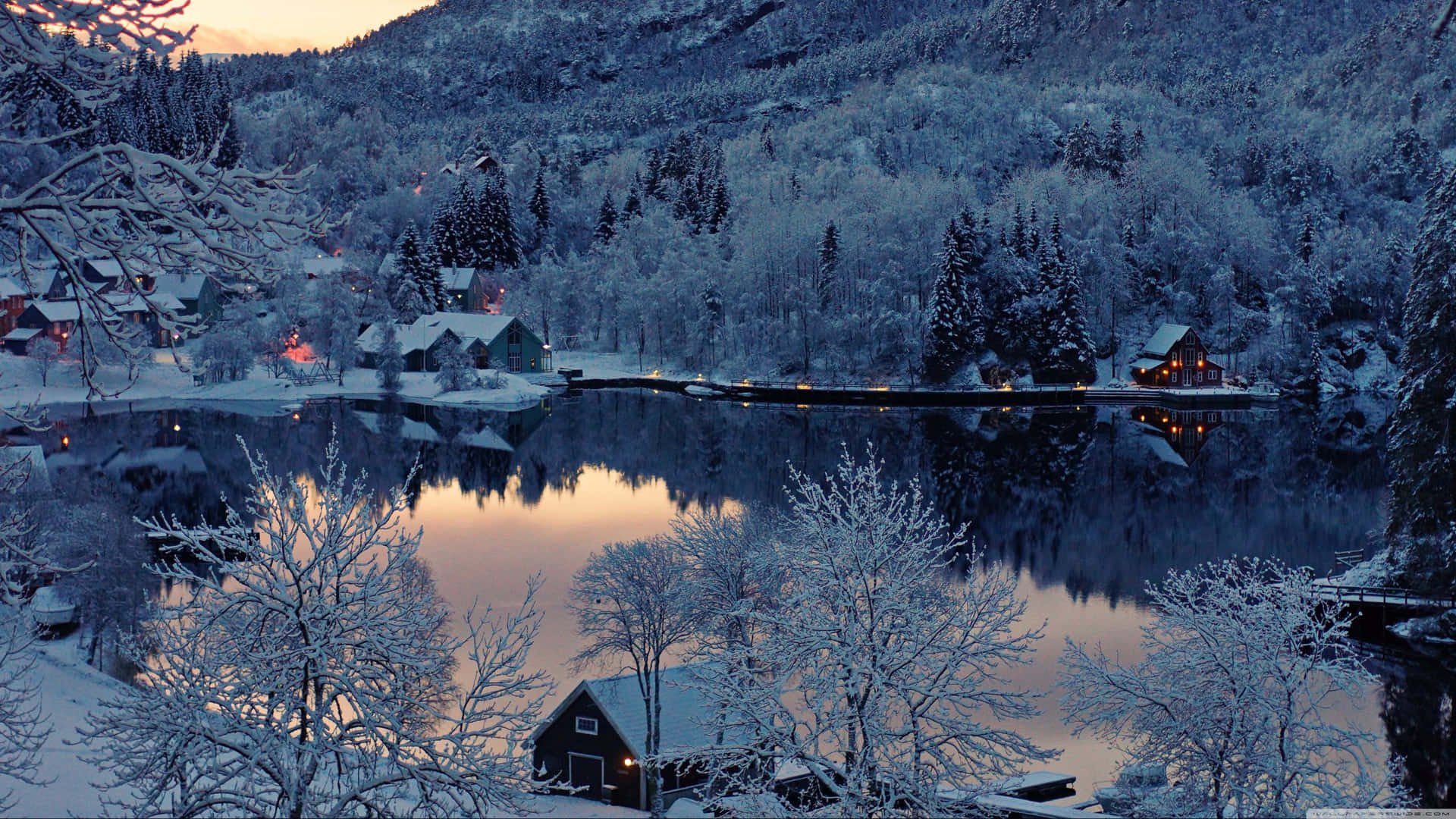 Snow Dusted Evergreens And Frozen Lake Lend Beauty To A Cold Winter Day Background