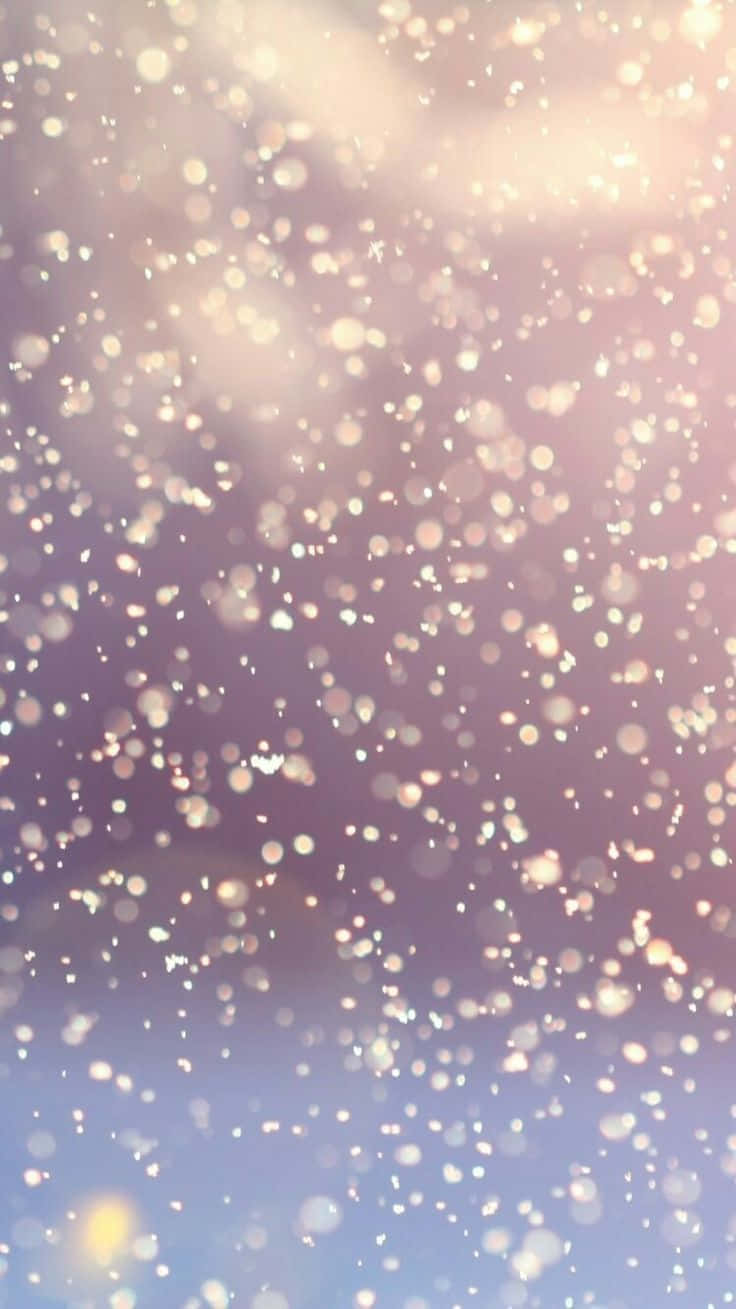 Snow Falling On A Blue Sky Background