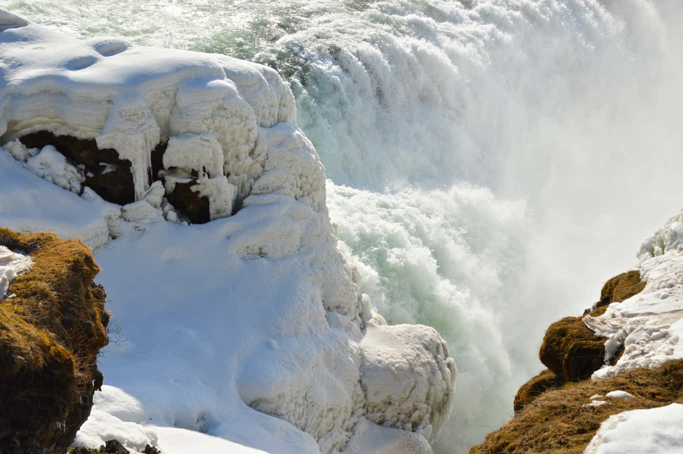 Snow In Gullfoss Waterfall In Southwest Iceland Background
