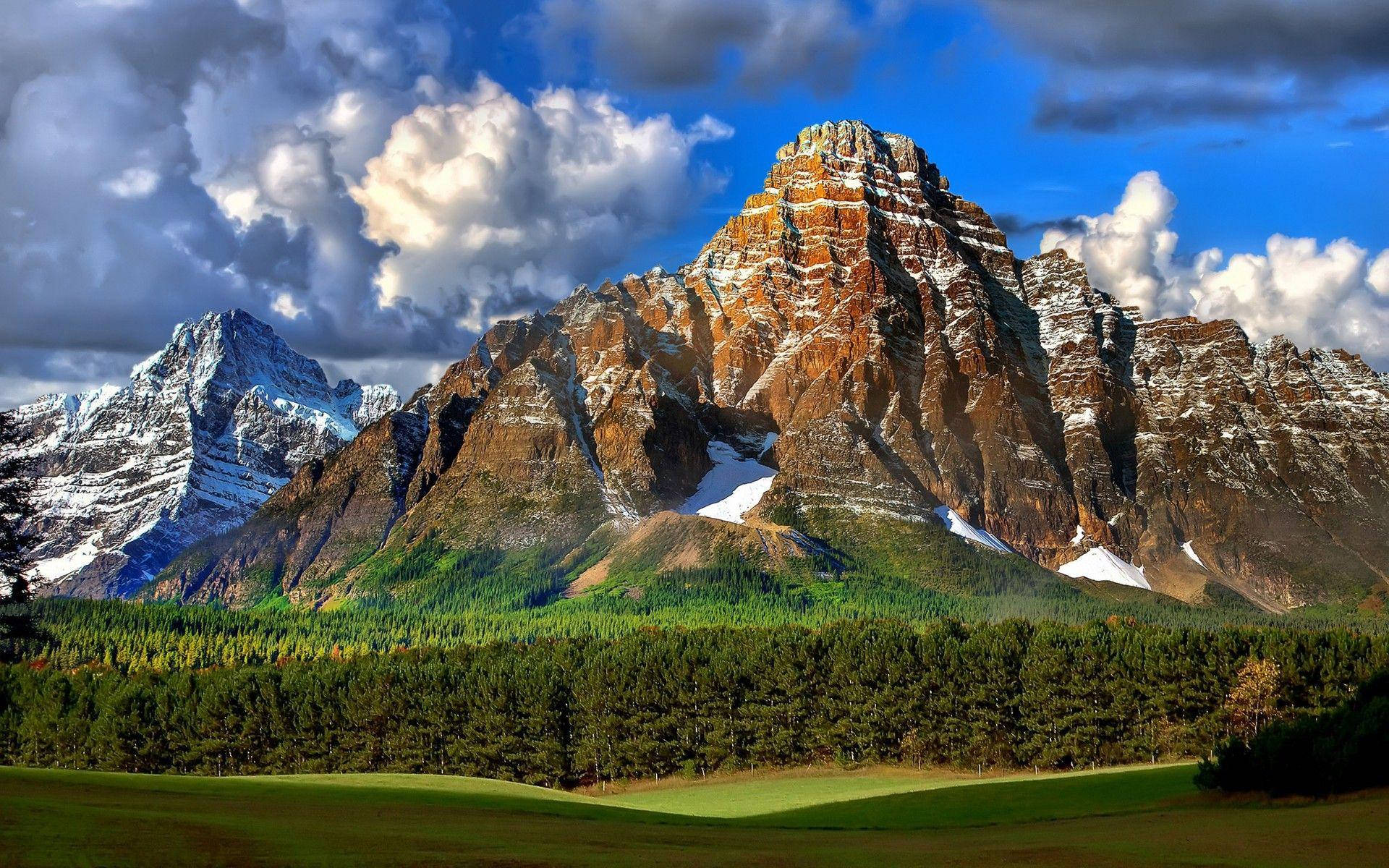 Snow-tipped Rocky Mountain Background