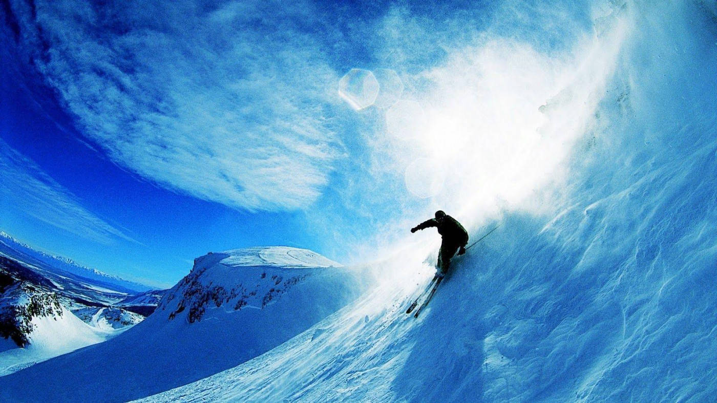 Snowboard Creating Wave Of Snow