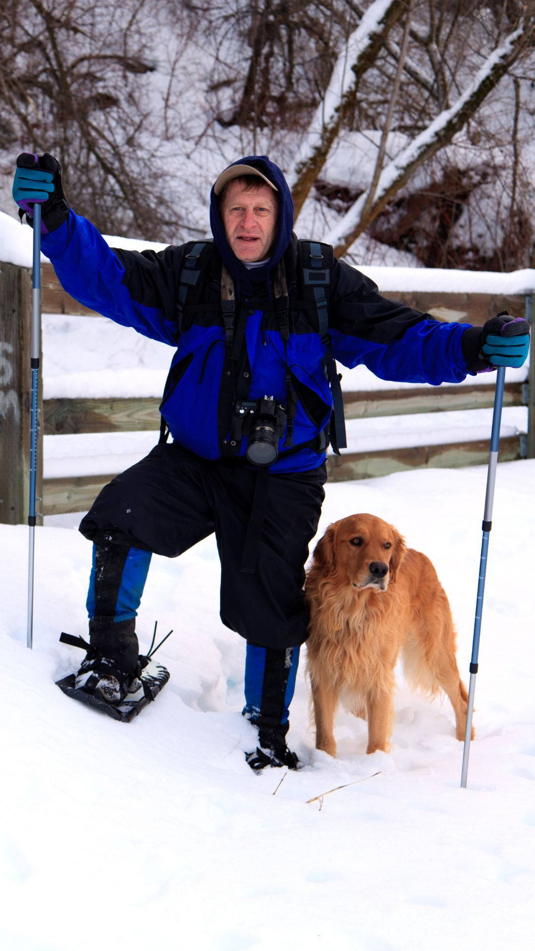 Snowshoeing Man And Dog Background