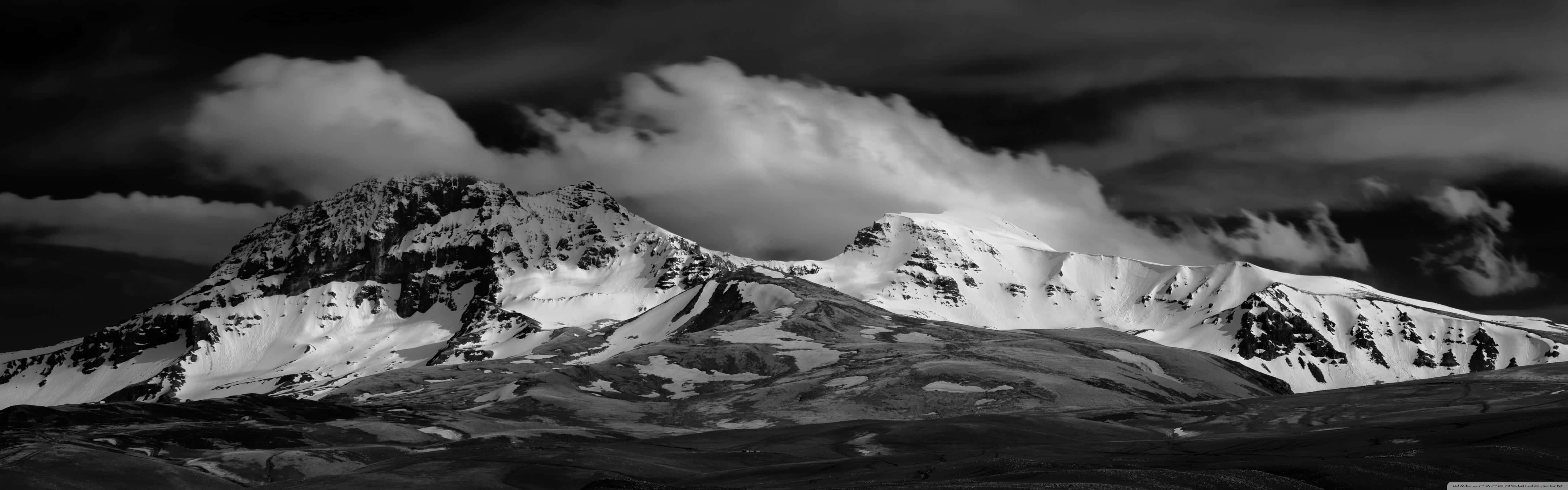 Snowy_ Mountain_ Peaks_ Black_and_ White_ Panorama Background