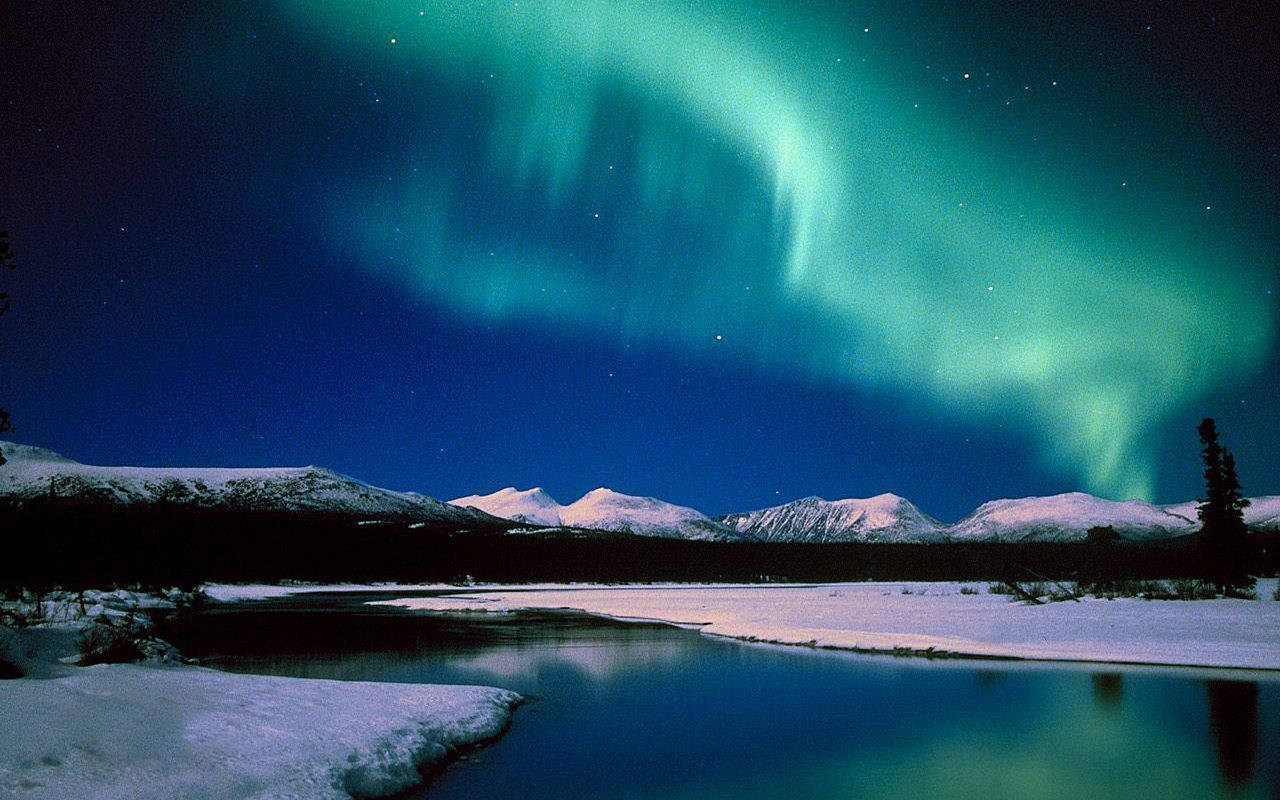 Snowy Mountains And Northern Lights Background