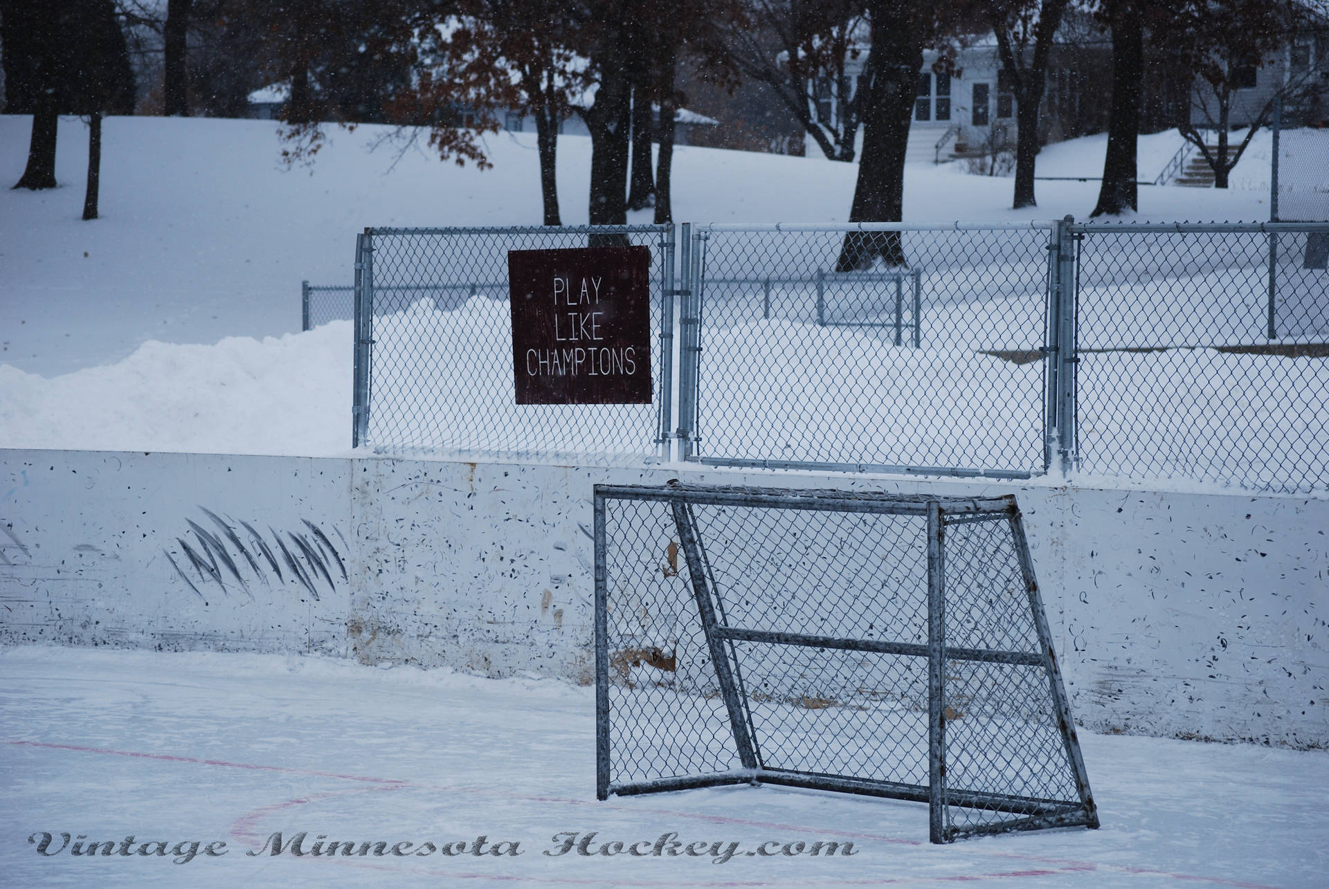 Snowy Outdoor Rink Hockey Gate Background