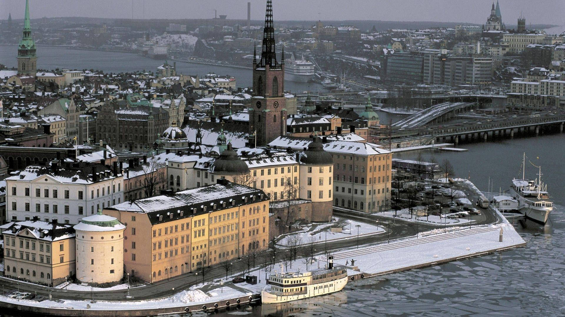 Snowy Stockholm Skyline In Winter Background