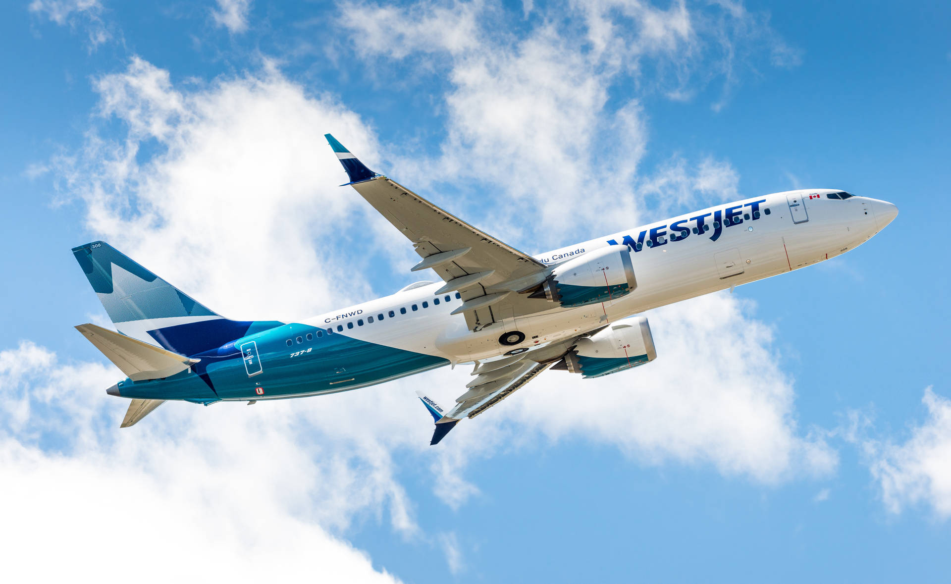 Soaring Westjet Airplane Background