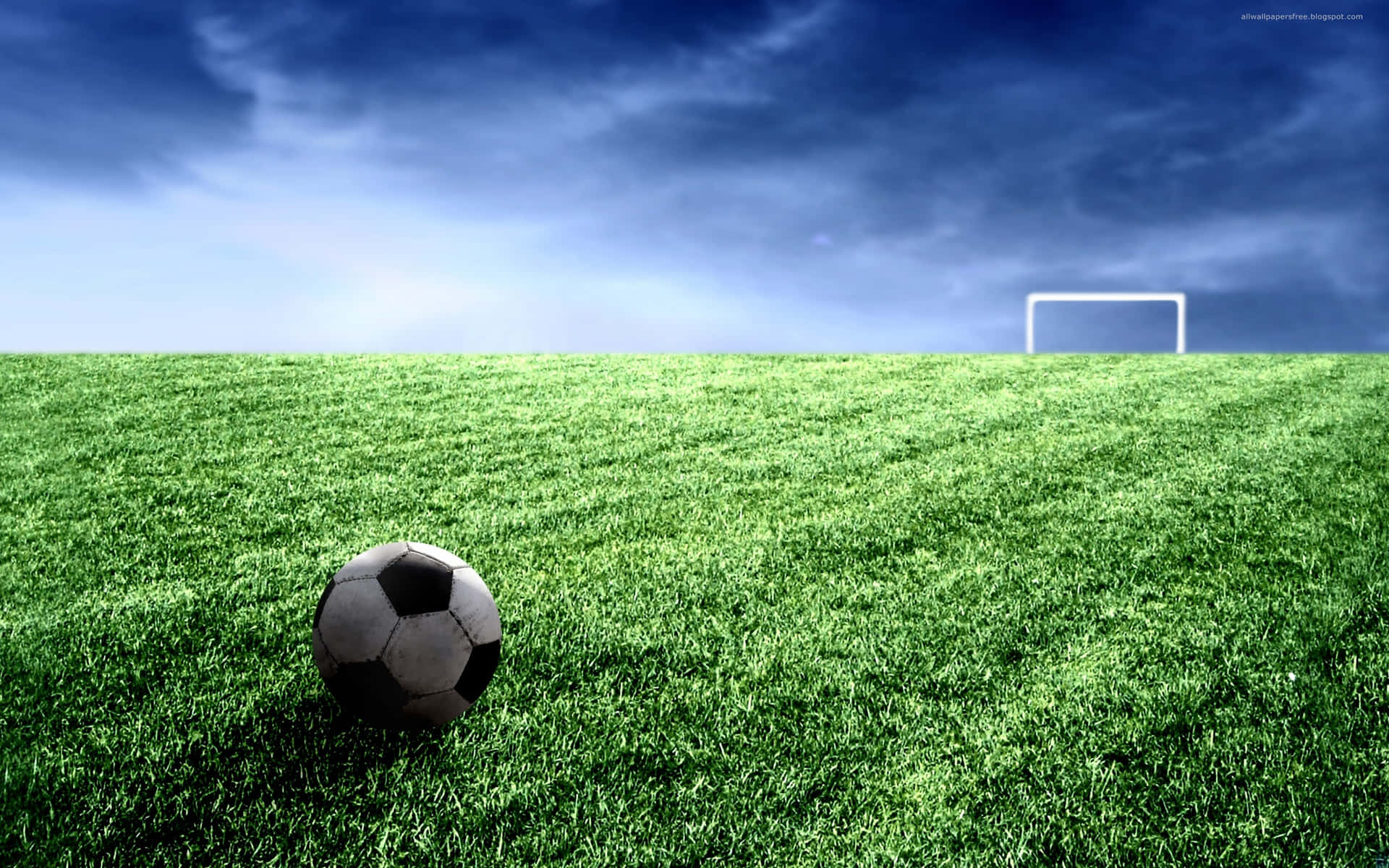 Soccer Ball And Goal Post On Football Field Background