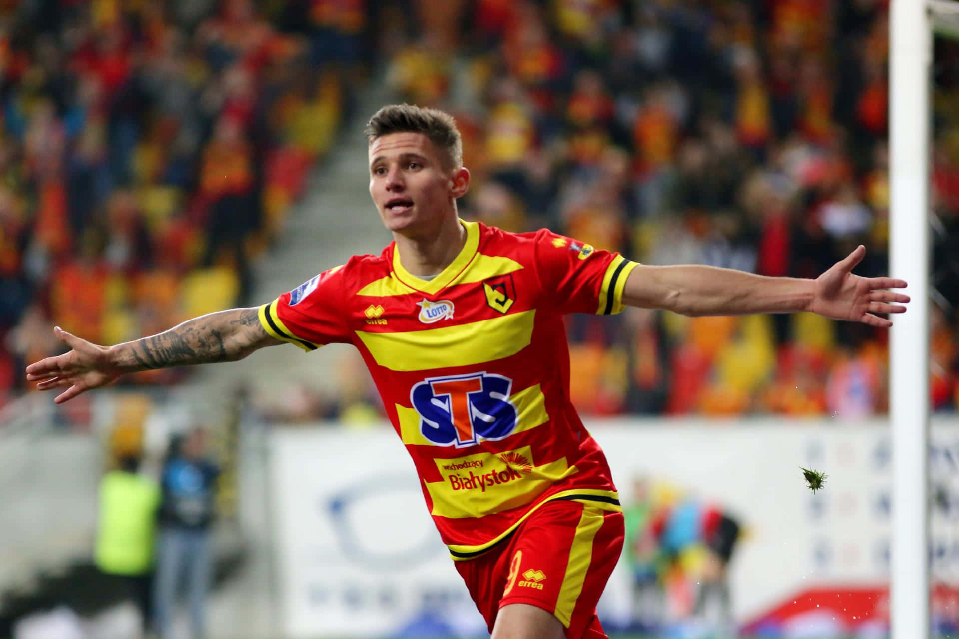 Soccer_ Player_ Celebrating_ Goal Background