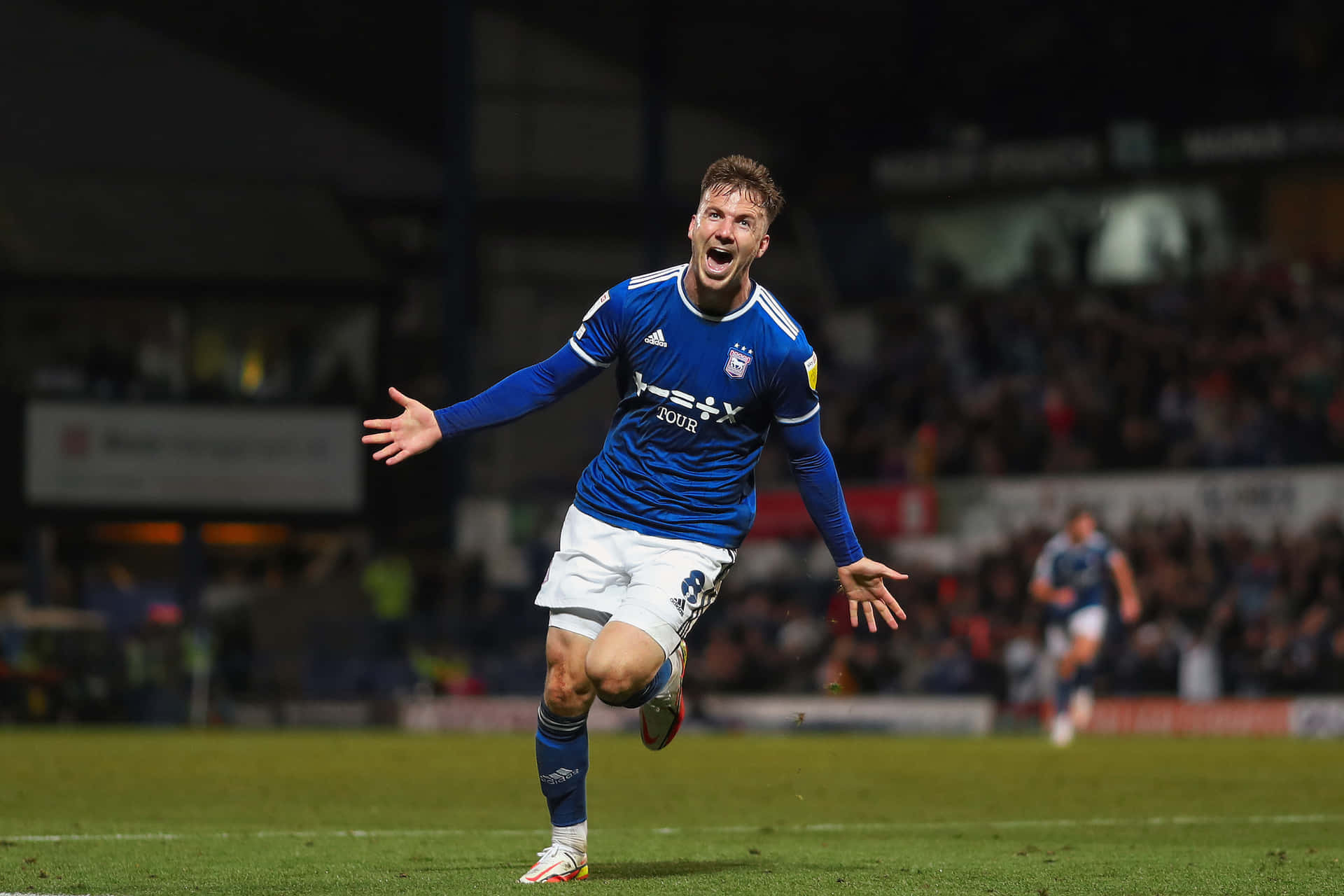 Soccer_ Player_ Celebrating_ Goal Background