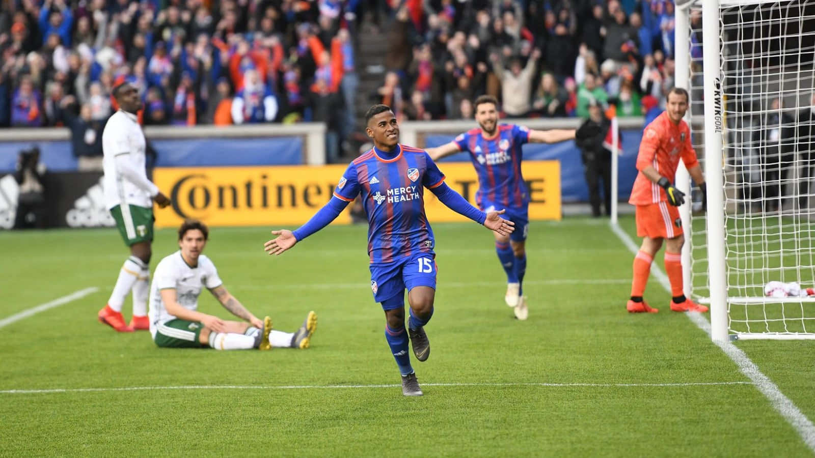 Soccer_ Player_ Celebrating_ Goal Background