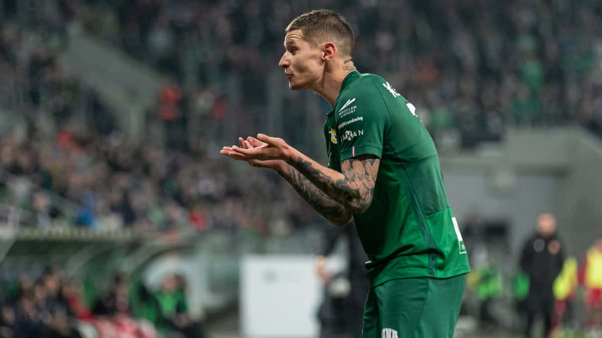 Soccer_ Player_ Celebration_ Gesture Background